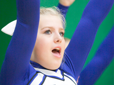 She cheered in vain.  Her team lost on a last-second tip-in.