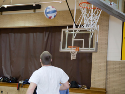 Trying to HEAD the ball into the basket.  Why not?