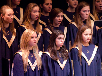 After the first choir finished singing, half the audience got up and left, making it impossible to hear the next group.