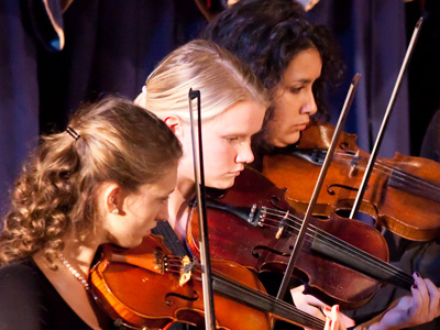 A dull concert was rescued at the end by the orchestra.