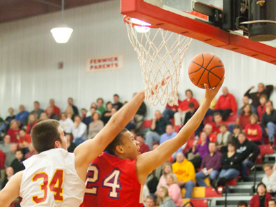 After driving past White 34 for this acrobatic layup, Red 24 went back on defense and blocked a shot by White 34.