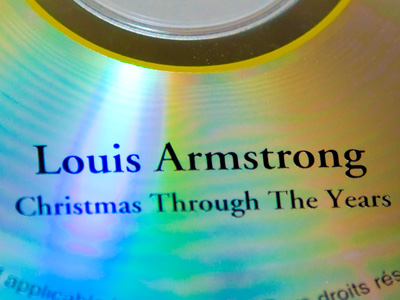 `I think I see ol` Santa in the keyhole.` LOUIS ARMSTRONG