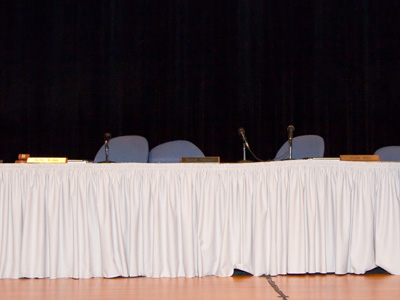 Turns out the group picture will not be in the quiet library.  It`s in the auditorium with hundreds of people looking on.