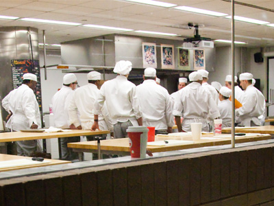 They`re performing surgery . . . on a side of beef.