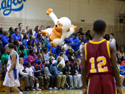 It`s the final seconds of a close game, and the student section is more interested in tossing around a big ape.
