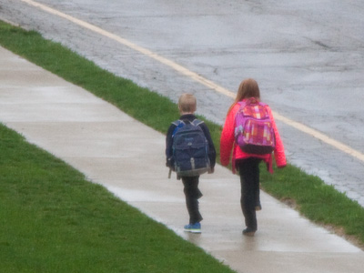 Marching in step on the way to school.  Why not?