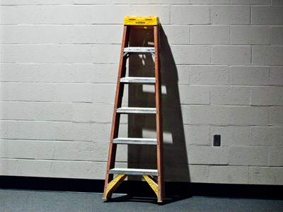 `Where d`ya want the ladder?` the custodian asked me.  `Down in the orchestra pit where the audience won`t see it during the concert.`  `Right here`s fine,` he said, and left.