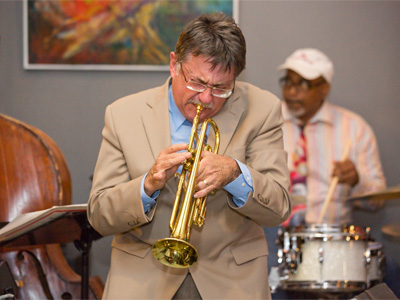 You step inside but you don`t see too many faces coming in out of the rain to hear the jazz go down. DIRE STRAITS