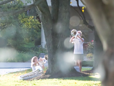 People making music are always interesting photo subjects, even if two glass doors are between us.