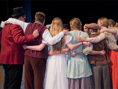 A pre-curtain pep talk.