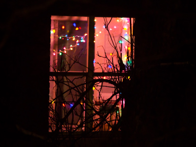 A neighbor`s window says HO-HO-HO.
