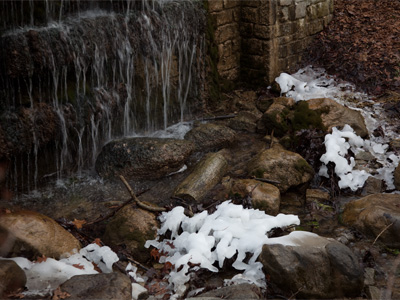 It was warm enough for people to be playing golf nearby, though the waterfall was still icy.