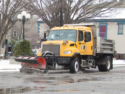 Snowplows struggle to keep up with the blizzard.
