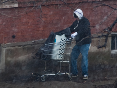 Finally, he put a couple of socks over his hands and then went on about his business.