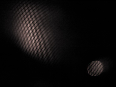 And here`s the same scene when the camera decided to focus on the window screen instead of the street outside.  Doesn`t it look a little bit like the moon?