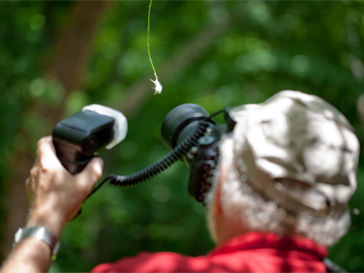 A participant in my photo workshop shoots a caterpillar.