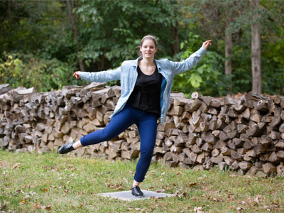 Beside the woodpile.
