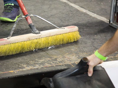 After each battle, bits of broken bot had to be swept away.