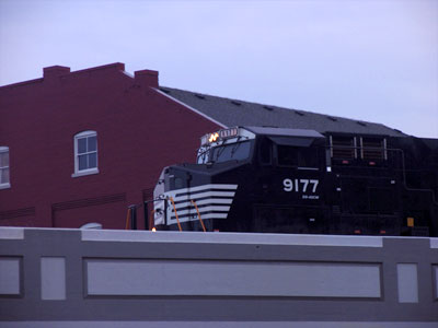 I`m stuck in Folsom prison, and time keeps draggin` on, but that train keeps a rollin` on down to San Antone. JOHNNY CASH