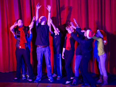 How many kids does it take to hang imaginary mistletoe?