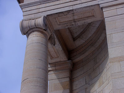 Architectural deception:  one column is visible from the side of the building, making it seem like there are more.