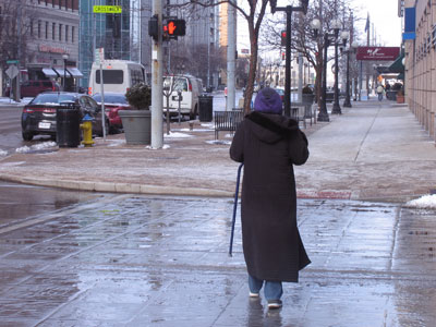 As I photographed this lady risking her life, another one behind me spoke:  `I don`t jaywalk.  I have a pacemaker.`