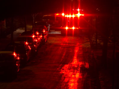 Ambulance on an icy night.