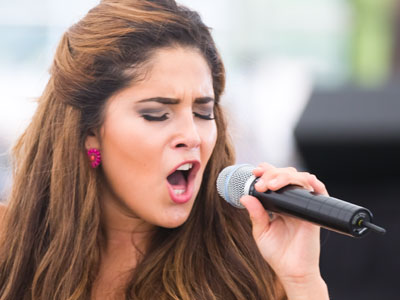 She would occasionally sing a word that I understood, like `corazon.`