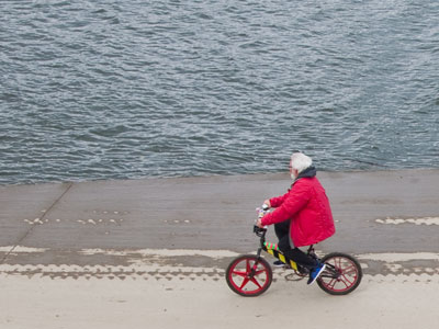 When he`s not driving a flying sleigh, he rides a bike.