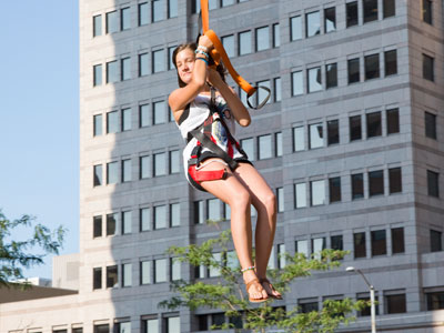 She`s riding a zipline in downtown Dayton, and I`m getting close to the point where I`ve seen everything.