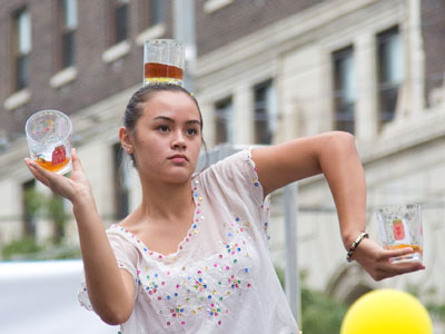 I doubt she`s old enough to drink what`s in the glasses.