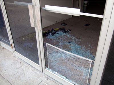 With their former hideout burned, I wasn`t surprised to see two shattered doors at a vacant building nearby.