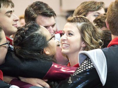 A group hug before their final performance of the year.