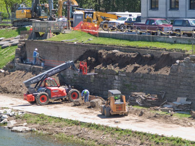 The entire retaining wall will be removed, and put back (see April 16 and 19 above).