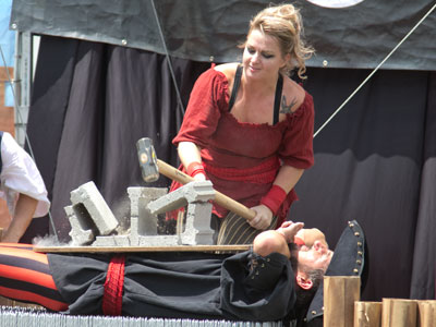 Oh, and he`s laying on a bed of nails.