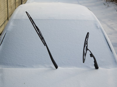More snow:  the cars throw up their hands in despair.