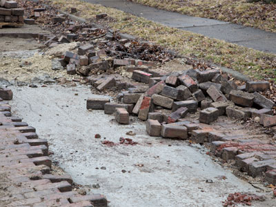 Replacing water pipes in a historic neighborhood means all those bricks have to be removed and then put back.