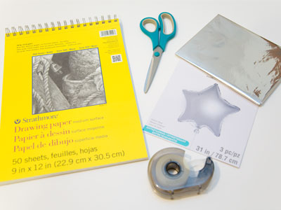 Okay kids, you`ll need some mylar balloons, sturdy paper, scissors and tape.