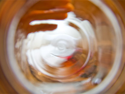 The kitchen seen through a Mason jar.