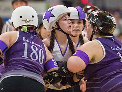 Yesterday was Roller Derby Photographer`s Day.  It was 2/8, a pun on f/2.8, which is funny to anyone who has tried to take photos of moving skaters in a poorly-lit rink.