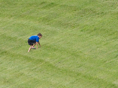 Gravity versus an eight-year-old boy.  Gravity is winning.