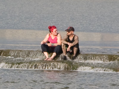 Just a couple enjoying a summer evening on the river.