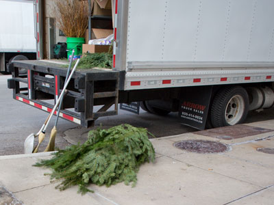 Deck the sidewalks with boughs of holly.