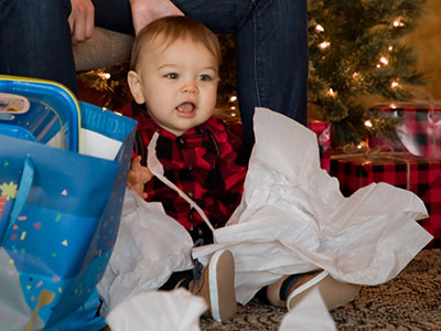 Joey enjoyed the wrapping paper more than the gifts.