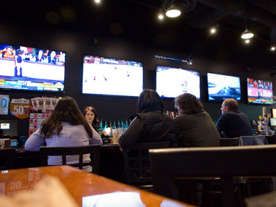 The music was good, the food was okay, but this place was not my scene.  LOOK AT ALL THOSE TVs!