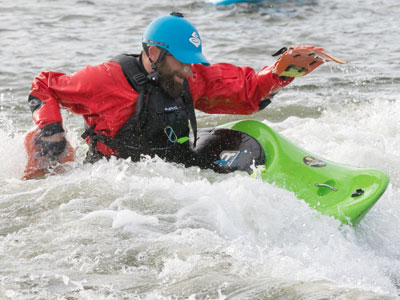 Nullifying millions of years of evolution, he uses paddles on his hands.