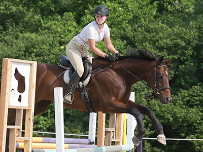 I belatedly figured out where to stand so the riders were looking in my direction when they came over the jumps.