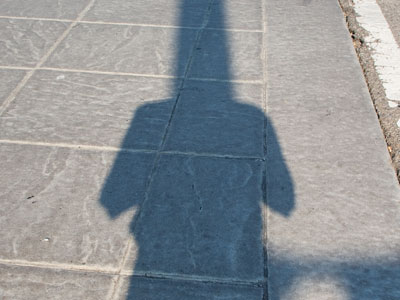 Crossing the street on a hot day.