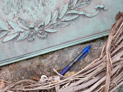 Someone left a pen at Paul Laurence Dunbar`s grave.