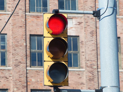 The first traffic signal was operated manually by a policeman standing nearby.  It lasted one month.